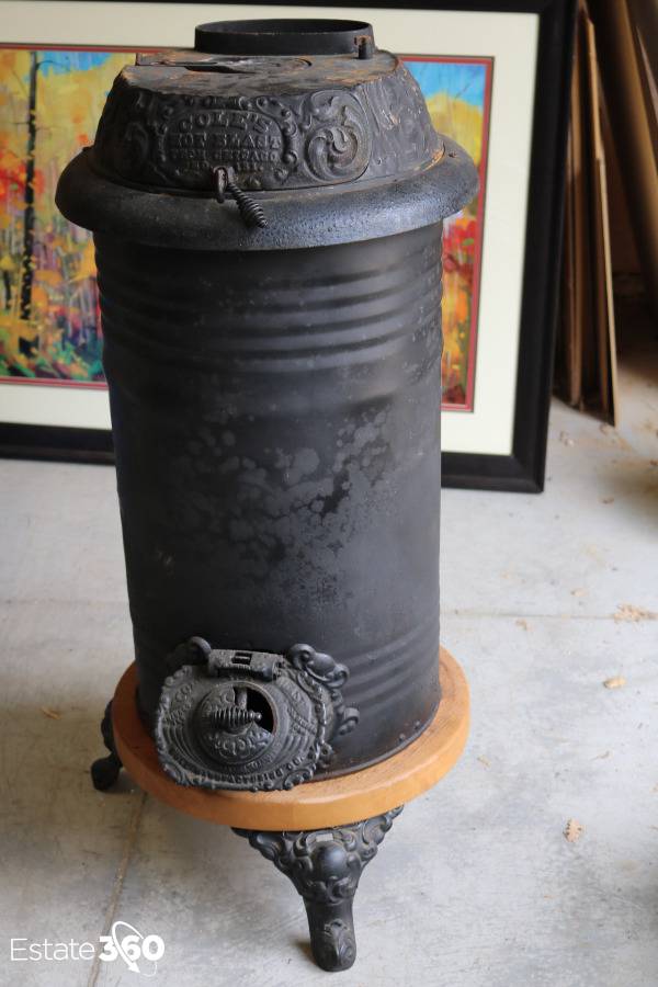 VINTAGE COLE'S HOT BLAST CAST IRON STOVE. Auction | Estate 360