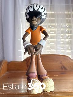 Vintage So So Def Afro Man Vinyl Figure Auction | Estate 360