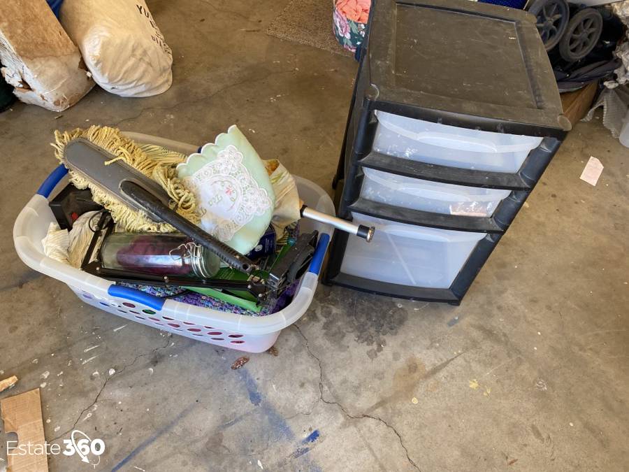 Rolling storage bin and basket of household goods Auction