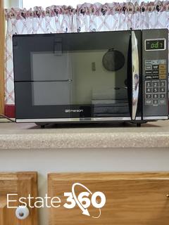 Sold at Auction: OSTER TOASTER OVEN WITH EMERSON MICROWAVE